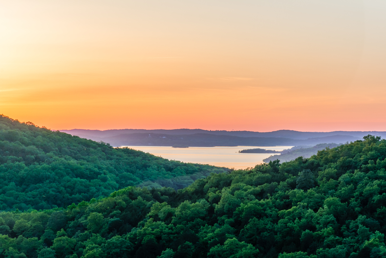 Colorful horizon overlooking Table Rock Lake in the Ozark Mountains at sunset