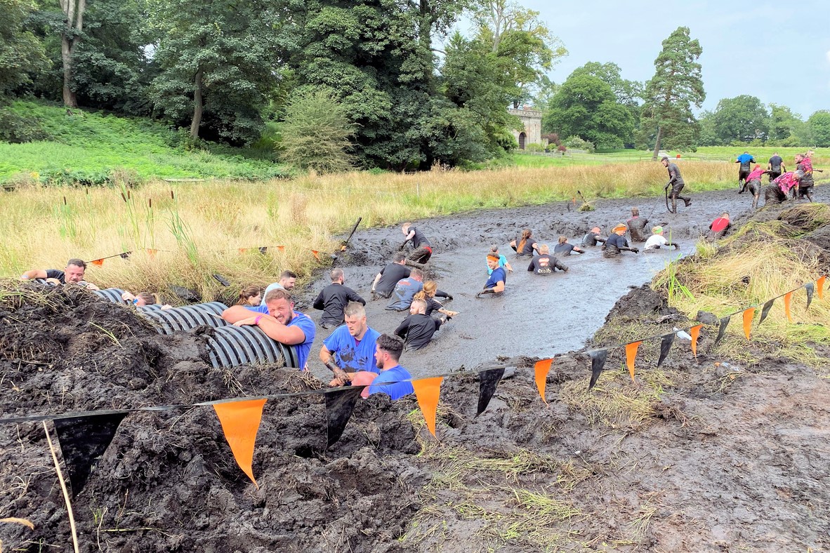 Cholmondeley in Cheshire in the UK in September 2021. People taking part in a Tough Mudder event in Cheshire